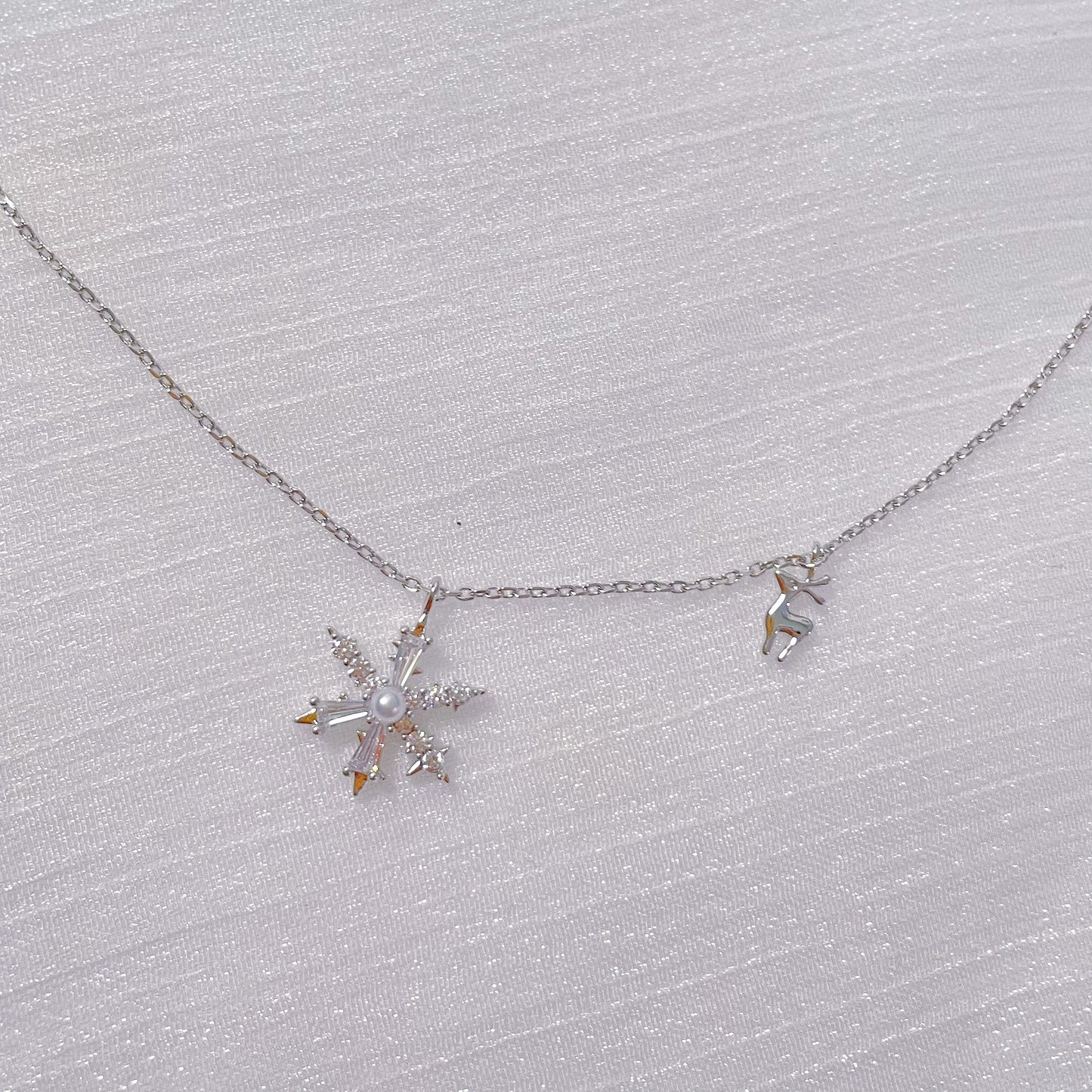 Platinum Plated Snowflake Elk Necklace